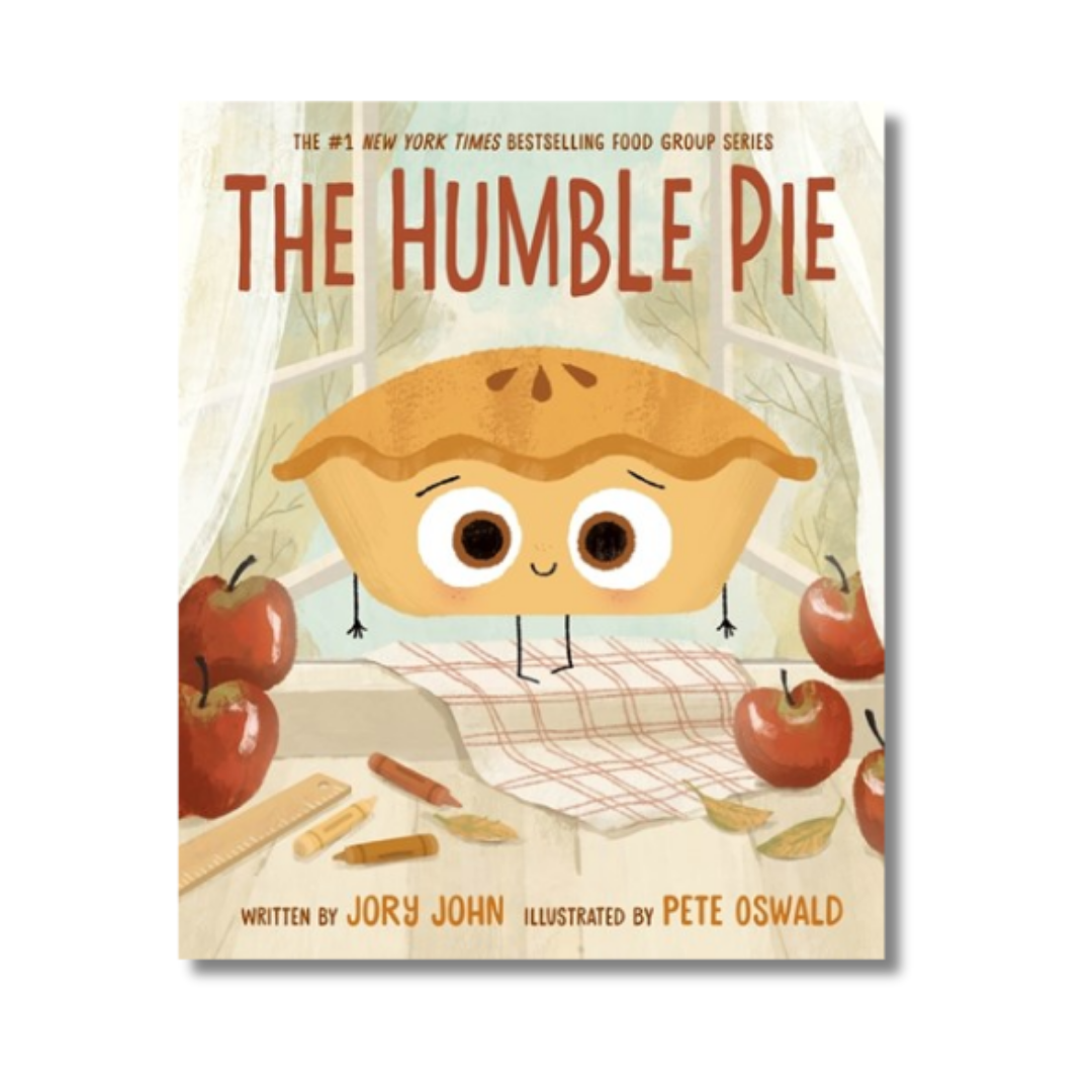 Book cover of 'The Humble Pie' with a cartoon pie character and apples on a white background